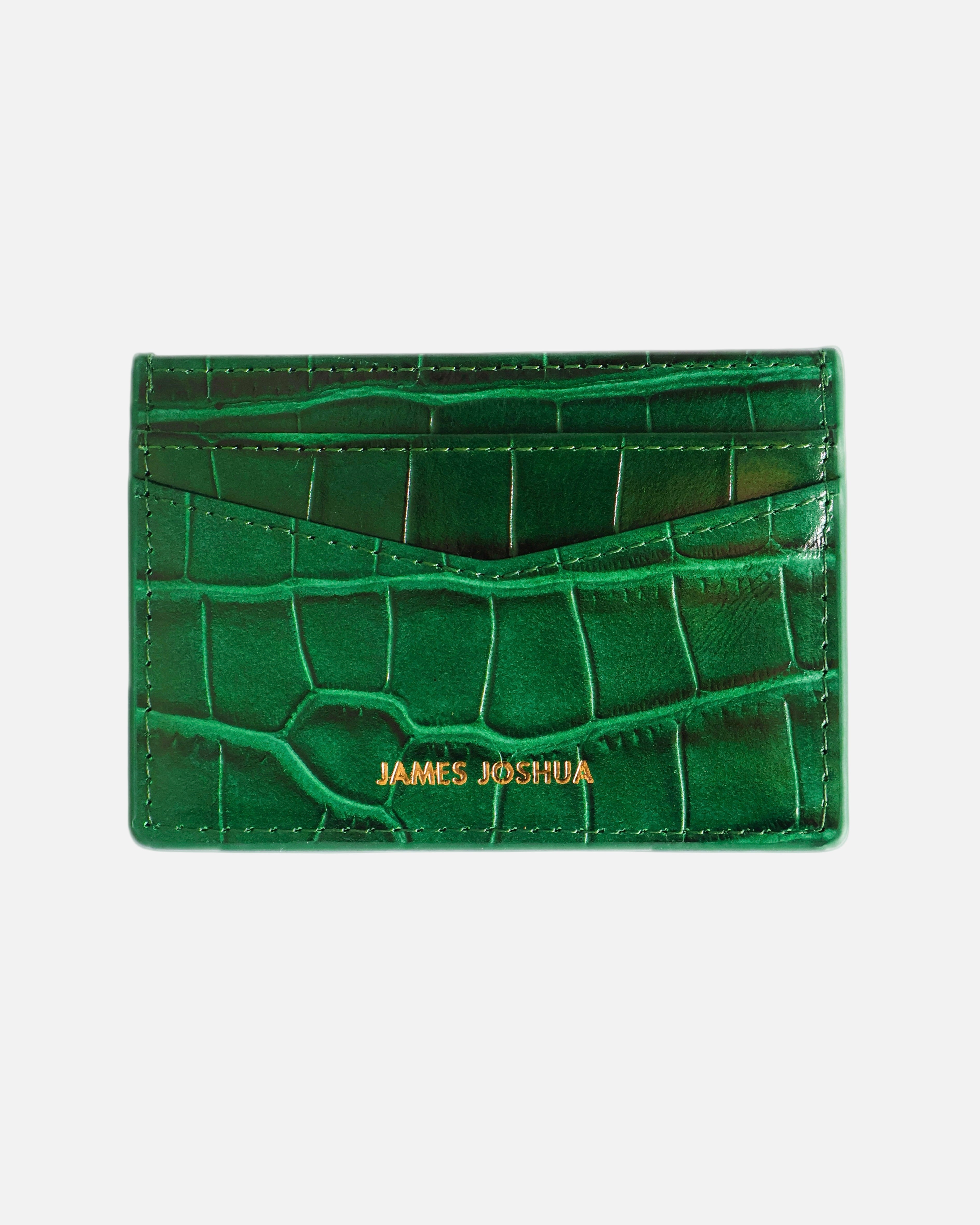 Green textured cardholder with 'James Joshua' branding on a white background