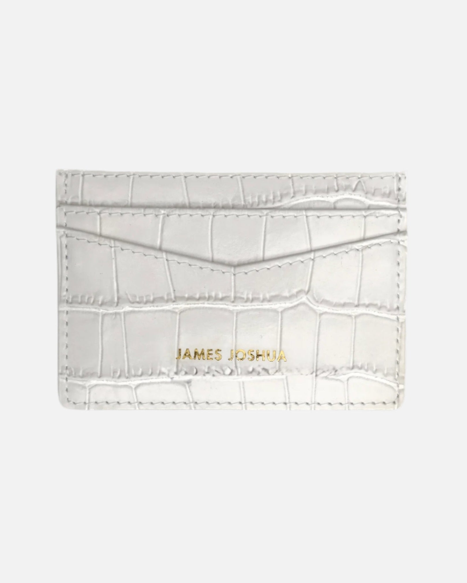 White cardholder with crocodile texture and 'JAMES JOSHUA' branding on a white background