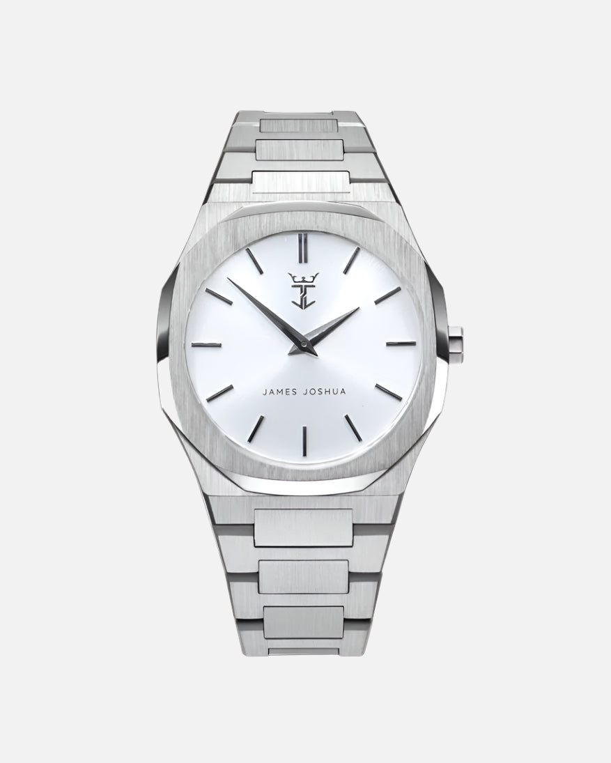 Silver watch with a white face on a white background